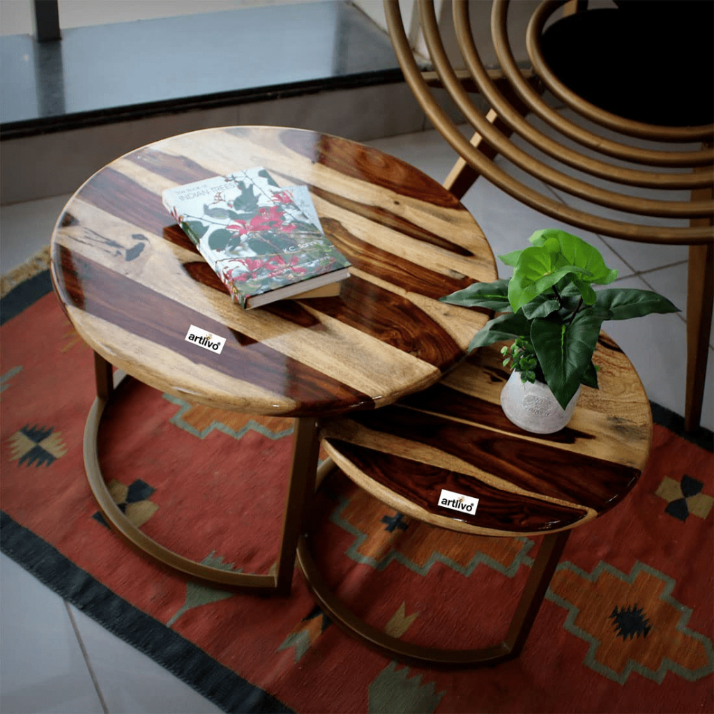 A set of round center tables for living room that can be put to multi-purpose use either individually or together.