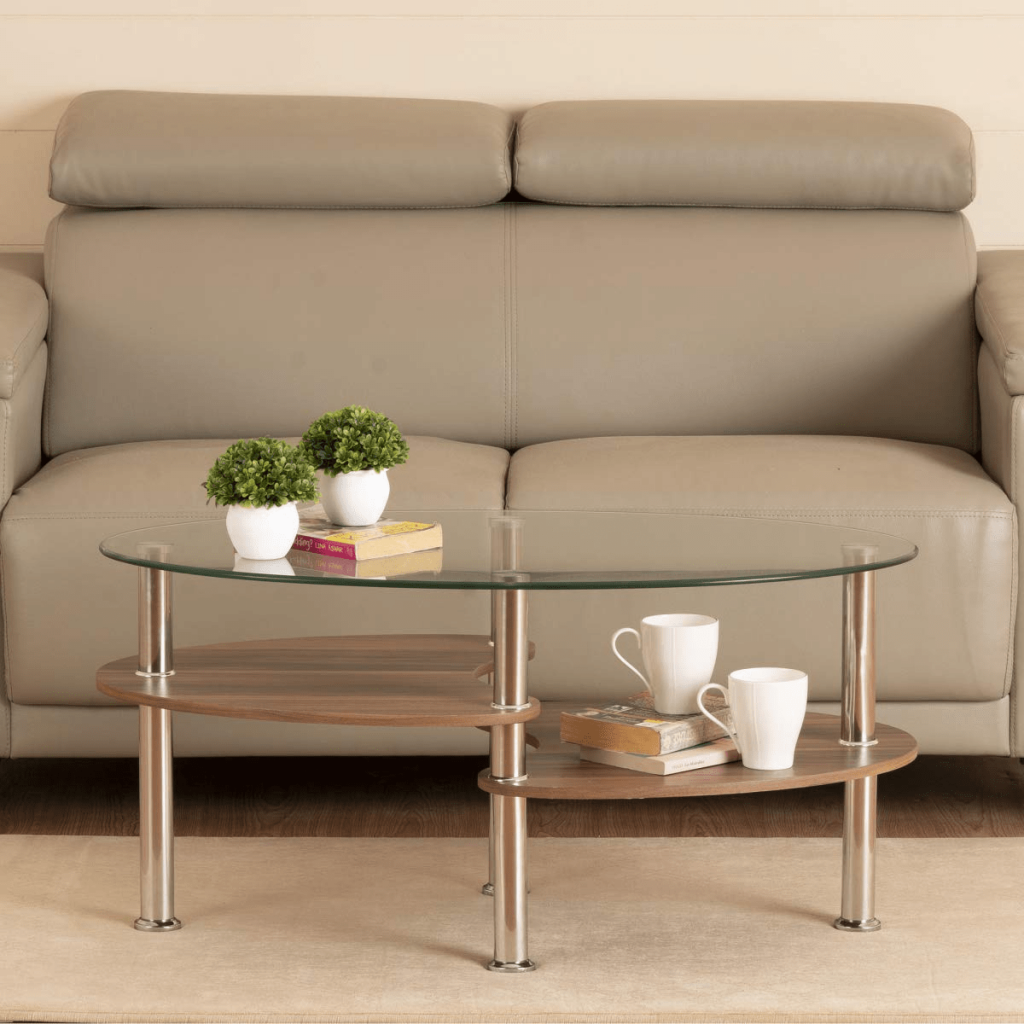 This is a wooden teapoy with glass top that is sturdy durable and offers ample storage space.
